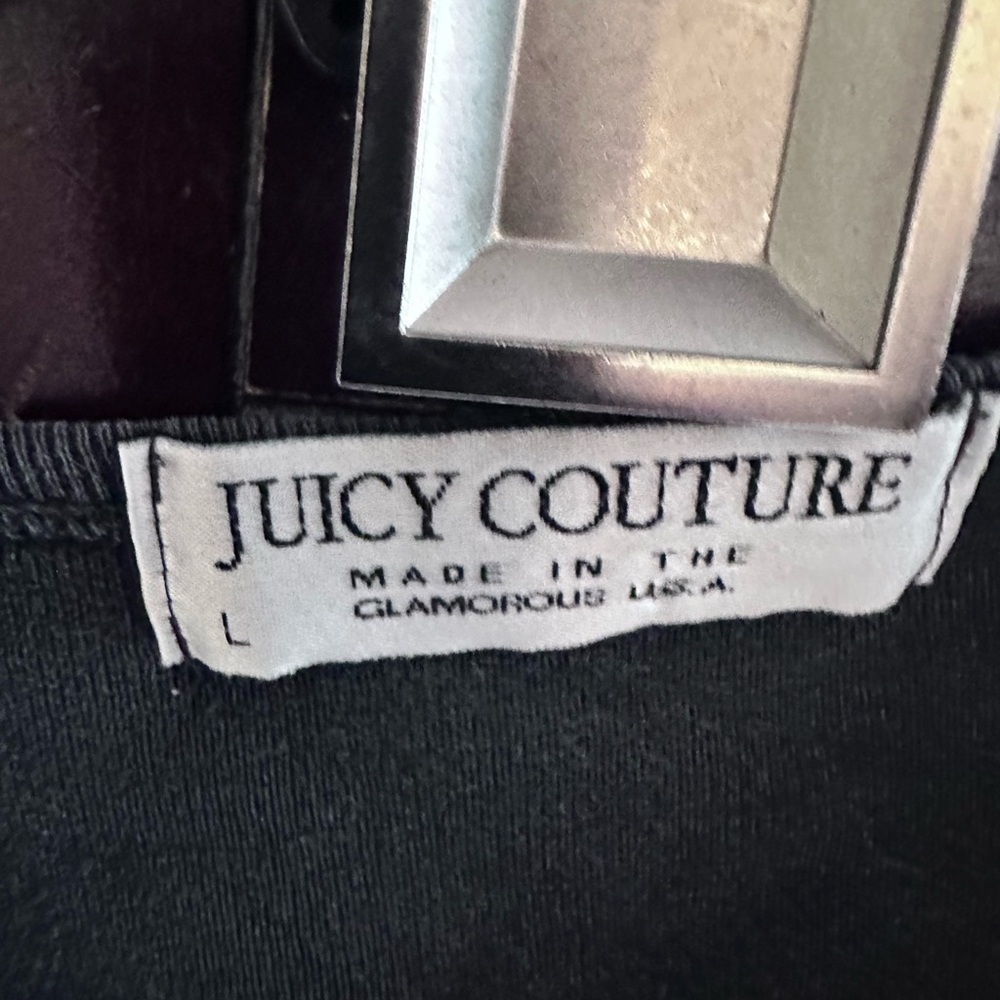 Excellent condition (just fade) vintage Juicy Couture top. Fits S, M & Jr L